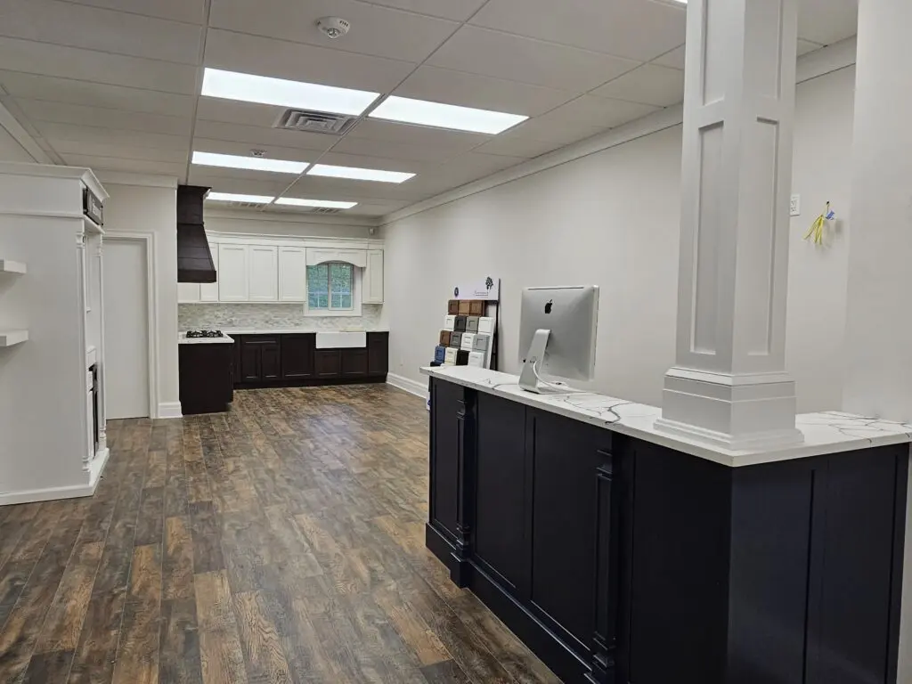 A room with a counter and cabinets in it