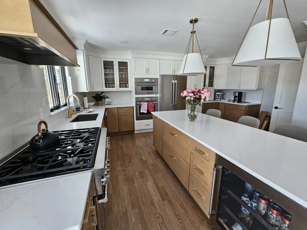 Kitchen with white and natural wood cabinetry