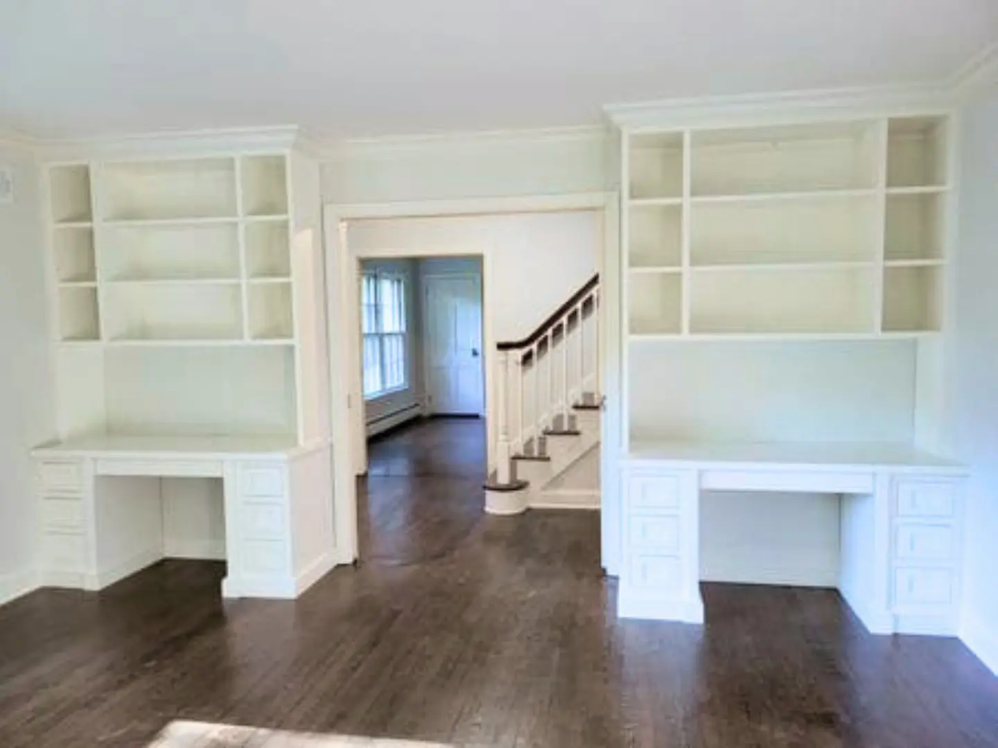 Impecca-Bull Office Cabinetry white desks and upper open shelving